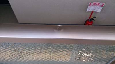 マンション手すりの凹み補修前の写真