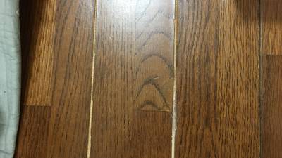 木目を描いて綺麗に補修されたフローリング